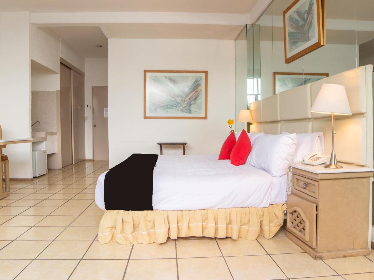 Capital O Monini Hotel